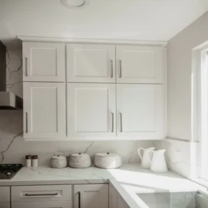 tiny kitchen with vertical storage running to the ceiling