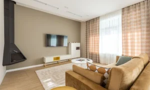 living room seating arranged to face a large window instead of a television wall