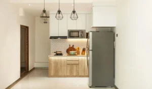 small modern kitchen with light cabinets