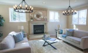 bright neutral living room with mirror and light walls