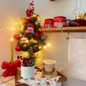cozy christmas coffee table styling with candles and small ornaments
