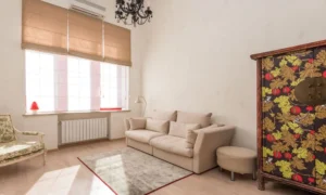 small living room floor plan showing furniture arranged around a radiator or fixed obstacle