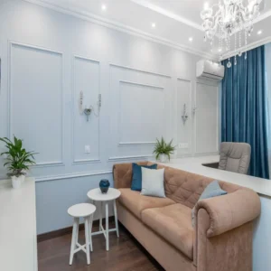 small living room with a sofa, coffee table, and clear walkway