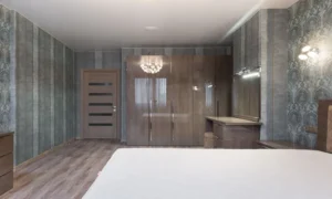 storage bed with drawers underneath in a small bedroom