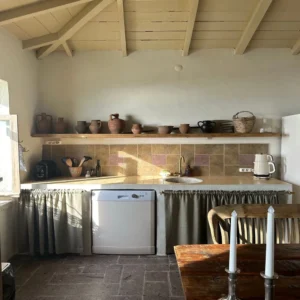 vintage kitchen open shelving ceramic dishes